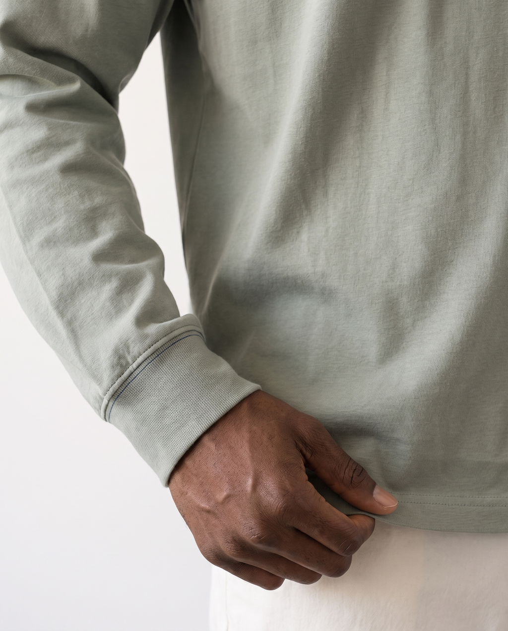 The Heavy Long Sleeve in gray green, cuff and hem detail