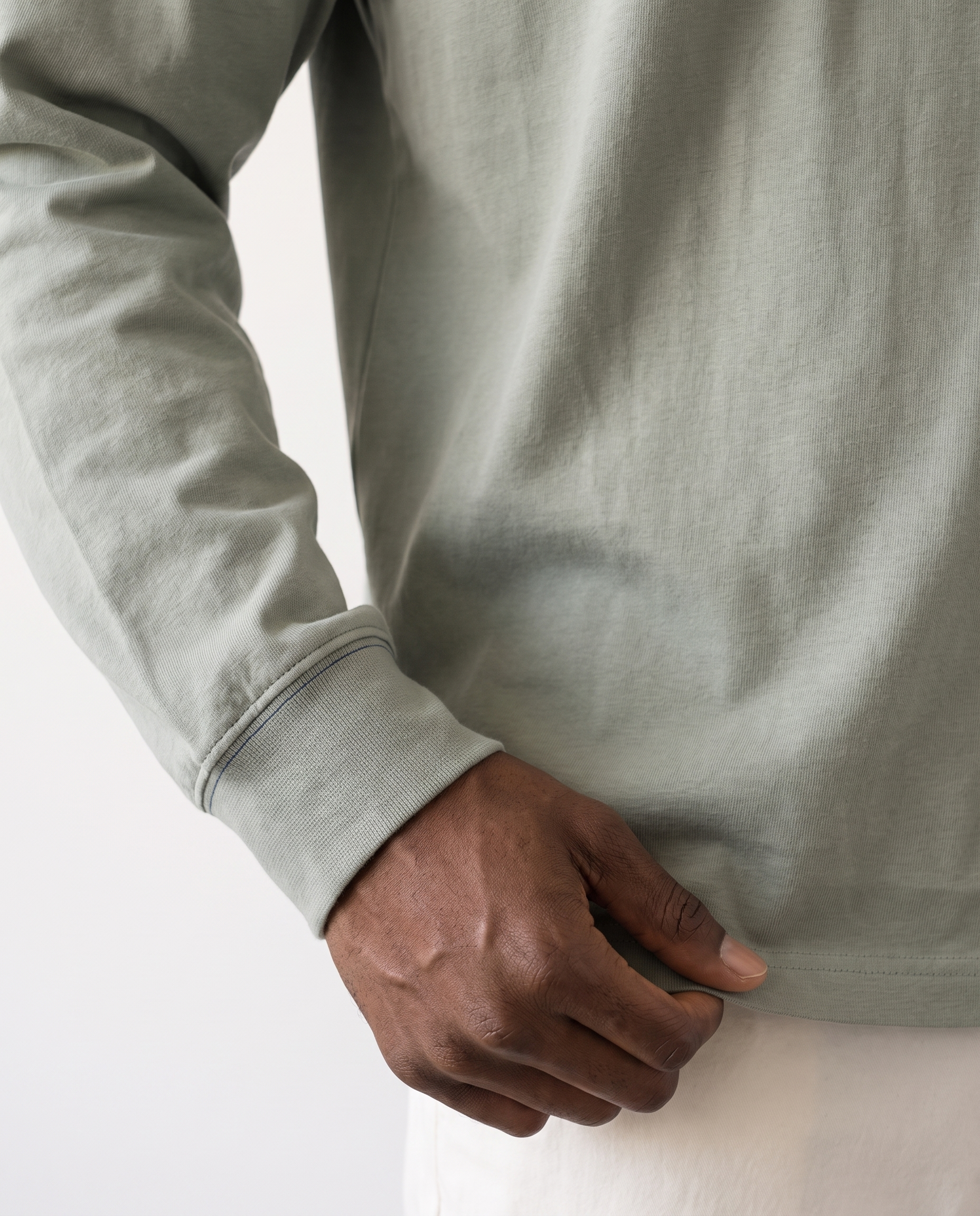 The Heavy Long Sleeve in gray green, cuff and hem detail