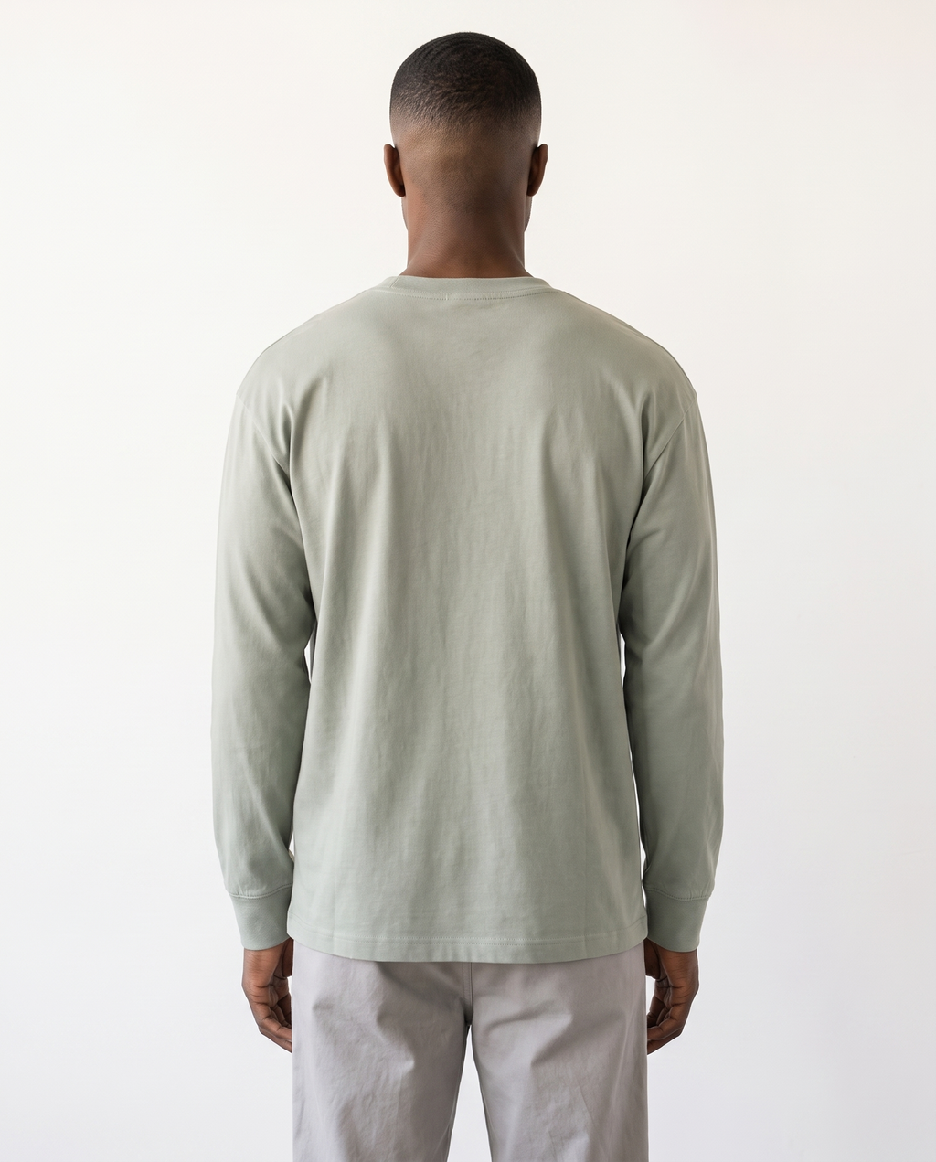 The Heavy Long Sleeve in gray green, back view