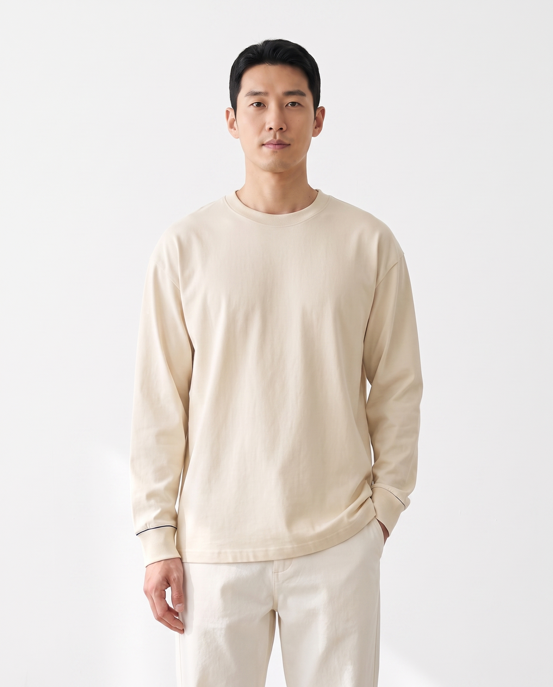color::Milk Apricot|The Heavy Long Sleeve in milk apricot, front, on model