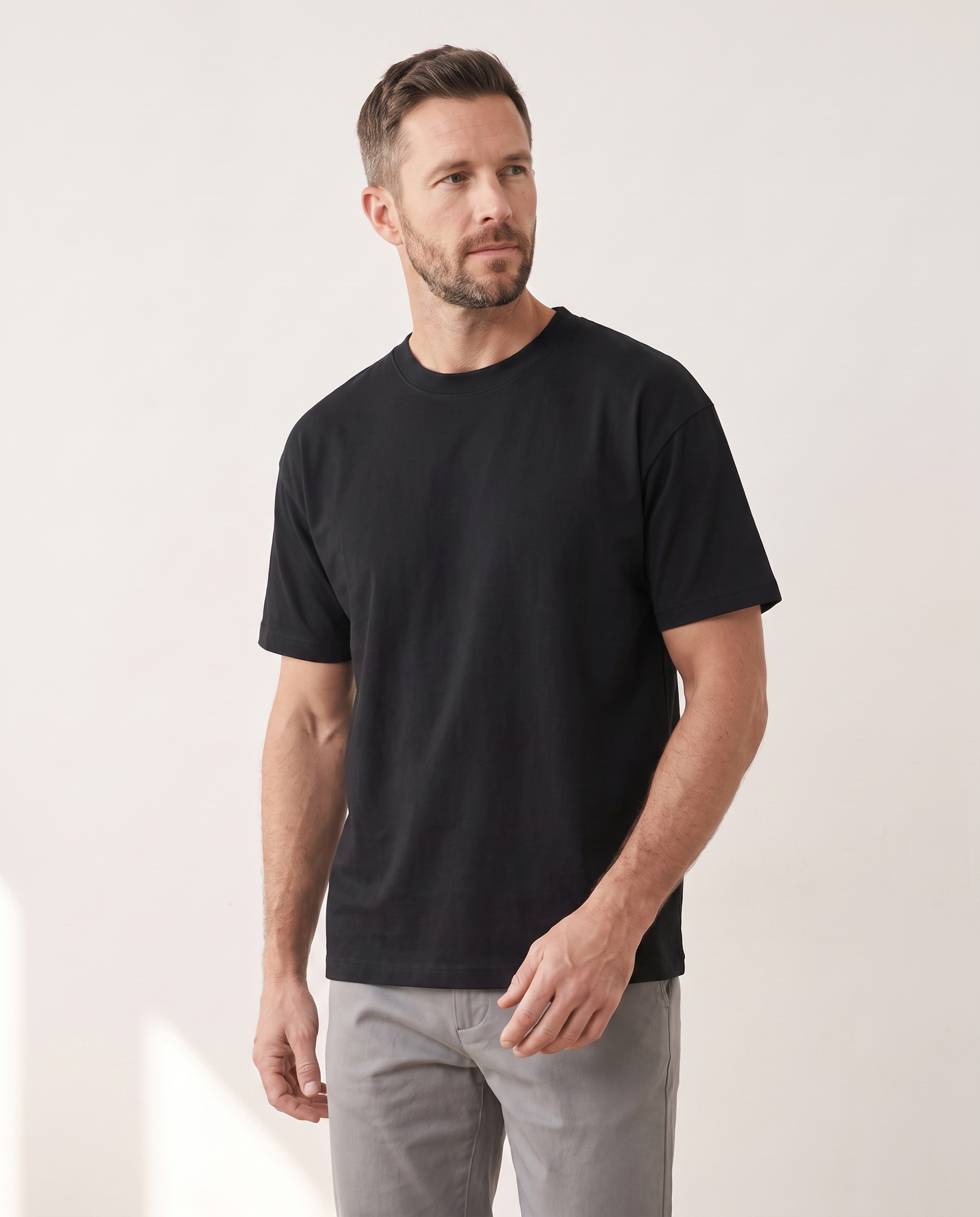The Everyday Tee in black, side view