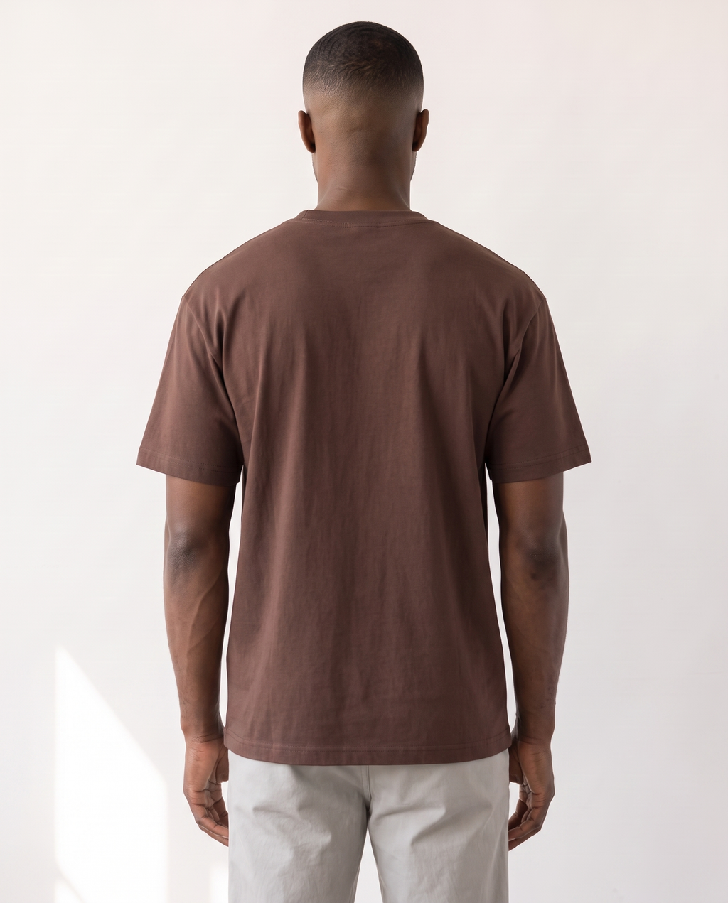 The Everyday Tee in latte brown, back view