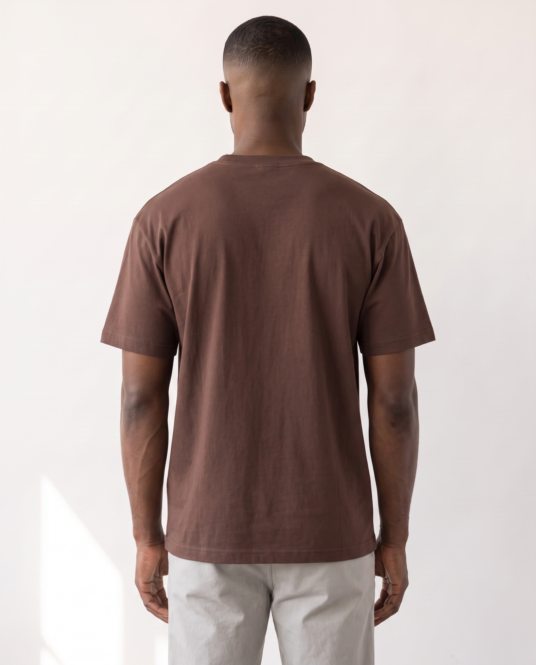 The Everyday Tee in latte brown, back view