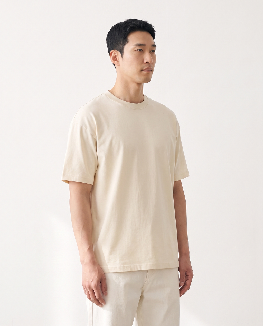 The Everyday Tee in apricot, side view