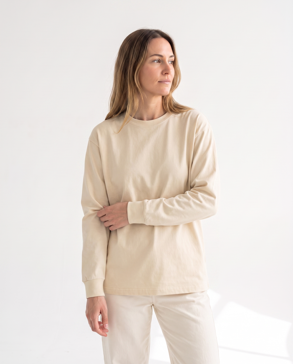 color::Light Apricot|The Heavy Long Sleeve in light apricot, front, on model