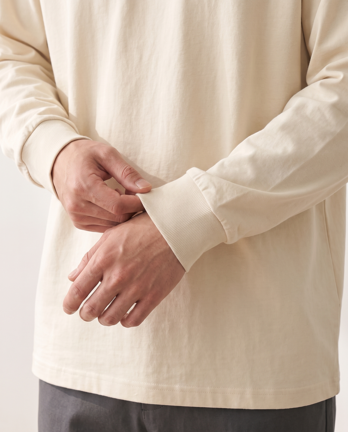 The Heavy Long Sleeve in milk apricot, ribbed cuff and fabric detail