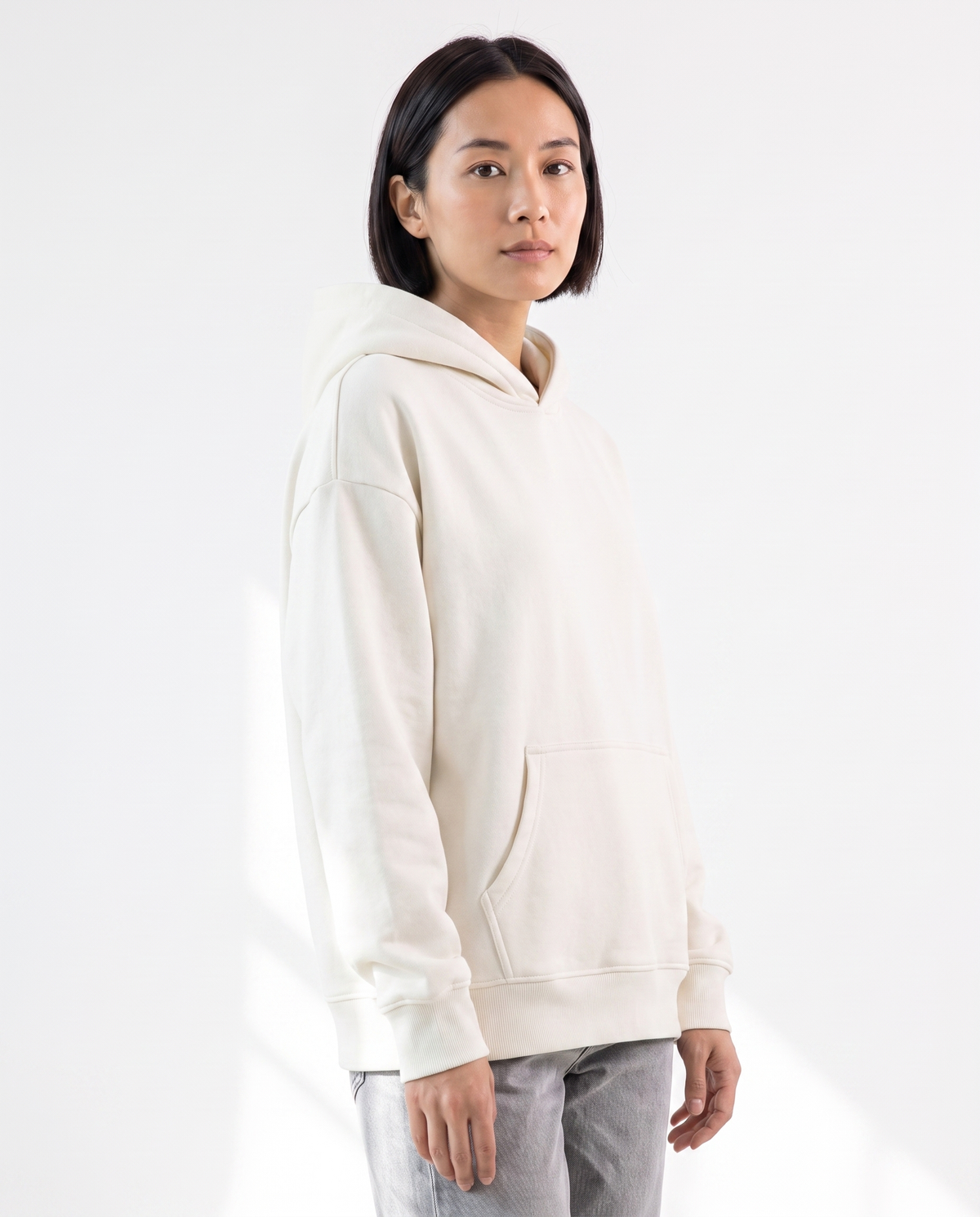 color::White|The Heavy Hoodie in off-white, front, on model
