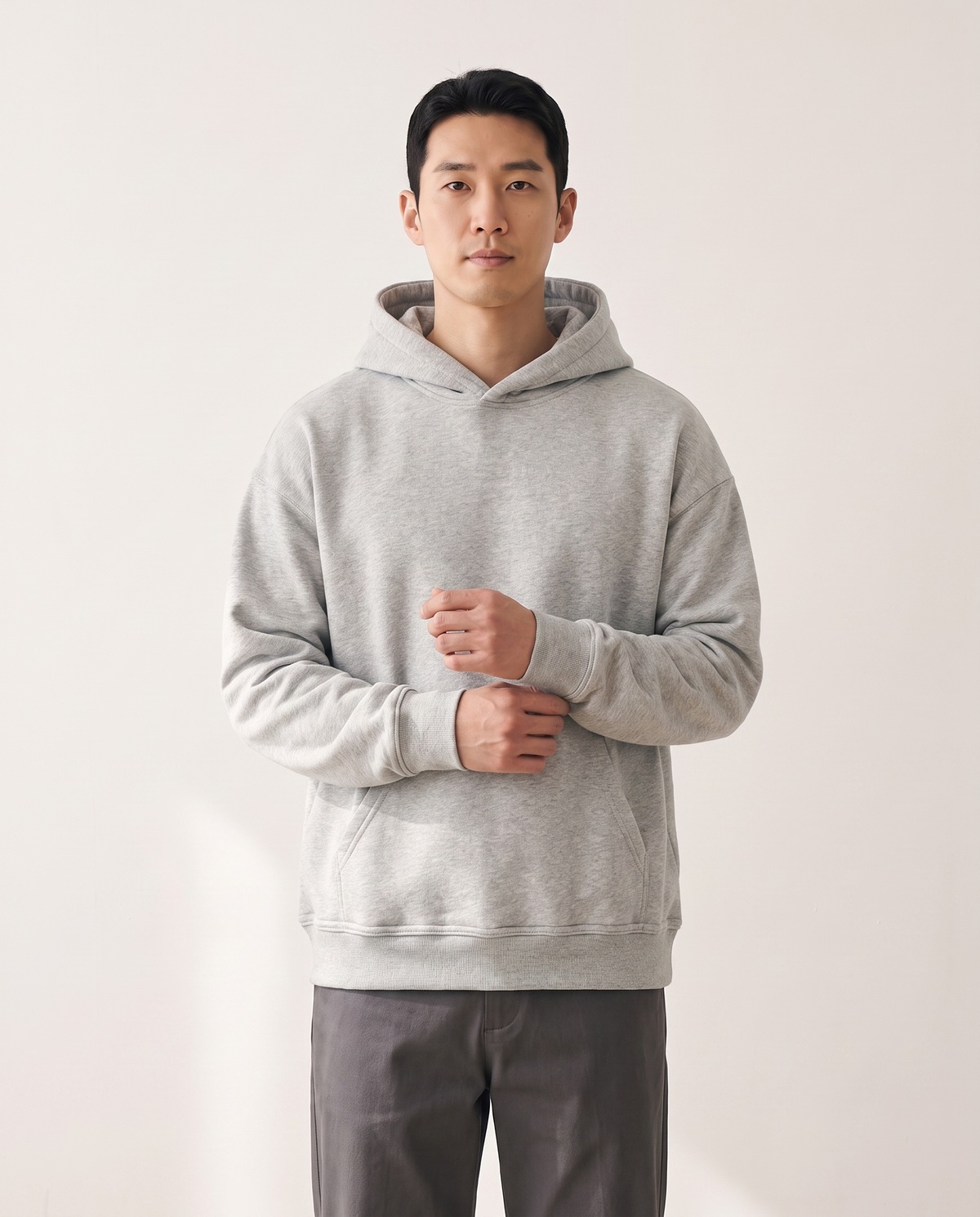 color::Grey Marl|The Heavy Hoodie in grey marl, front, on model