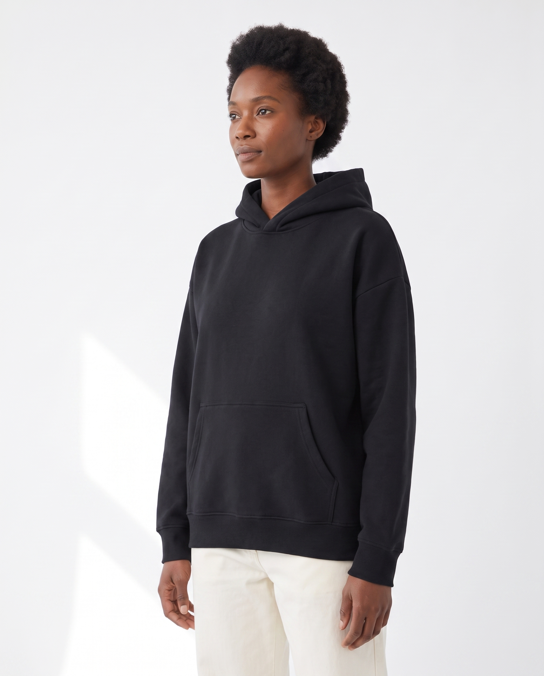 The Heavy Hoodie in black, side view