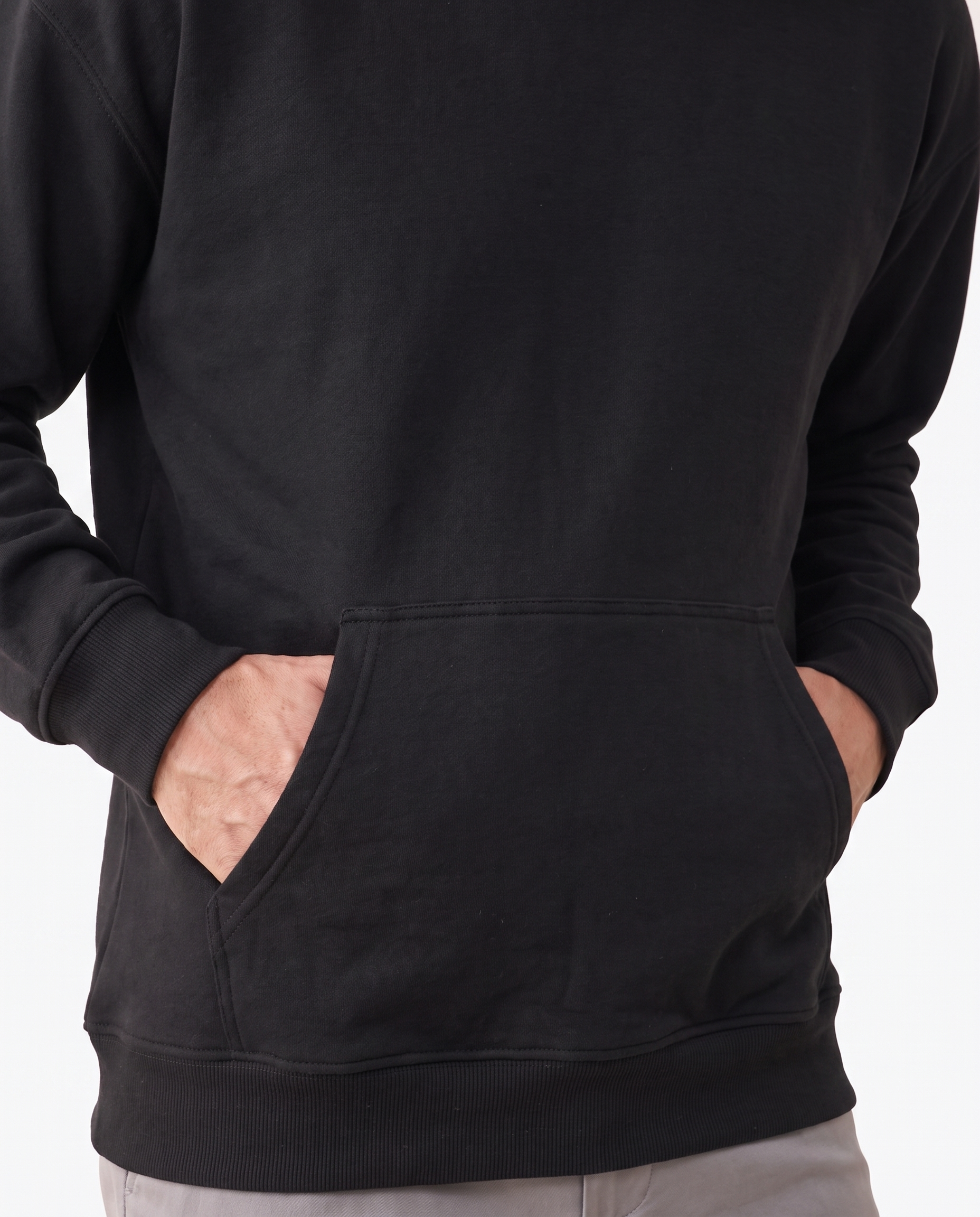 The Heavy Hoodie in black, kangaroo pocket and ribbed hem detail
