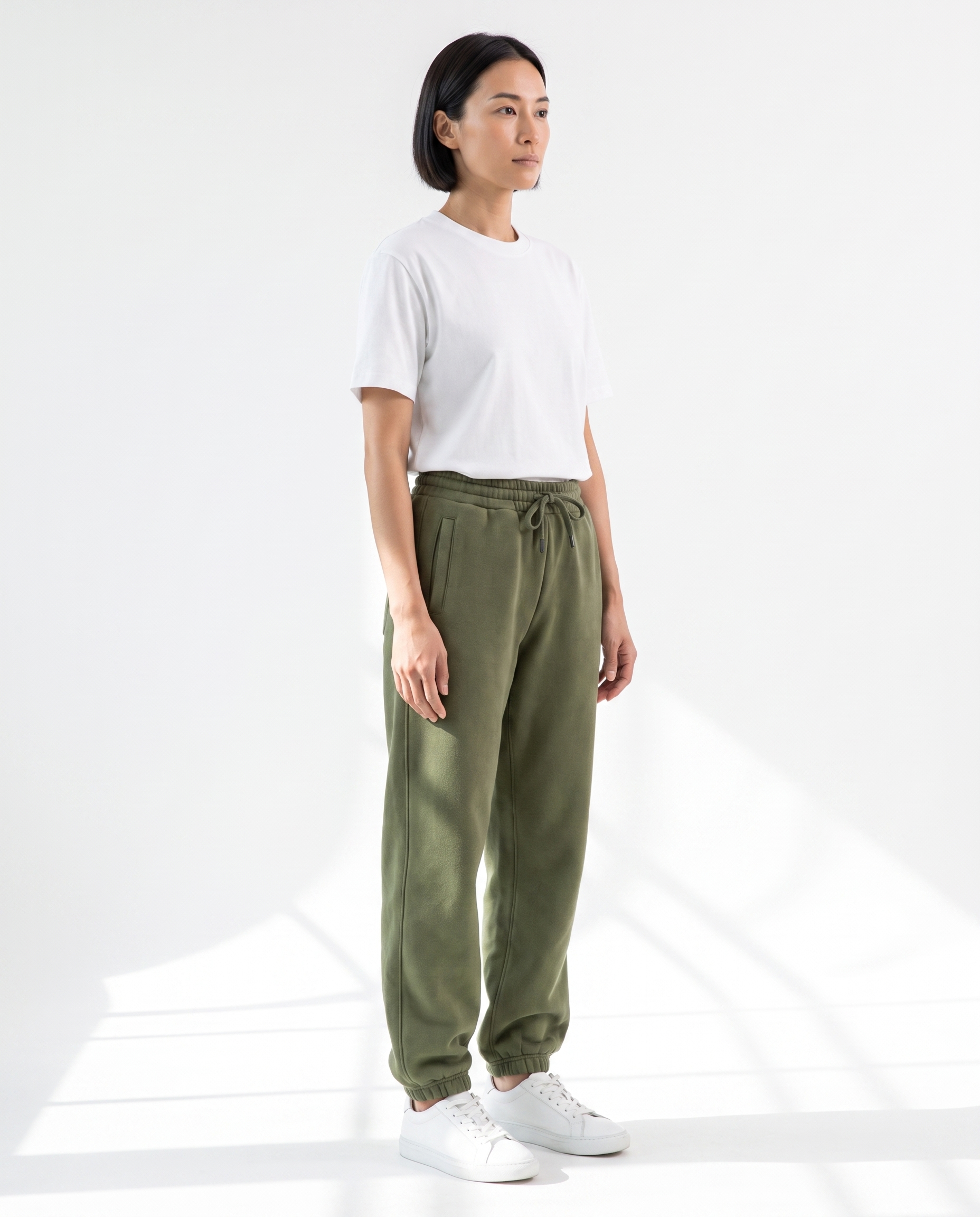 The Heavy Sweatpant in olive, side view