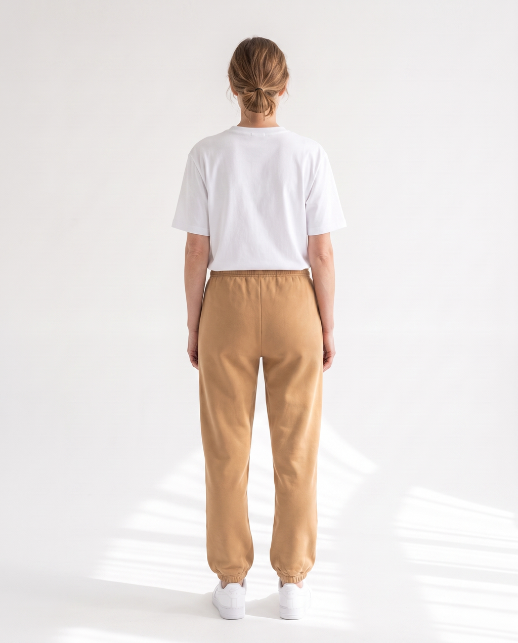 The Heavy Sweatpant in camel, back view
