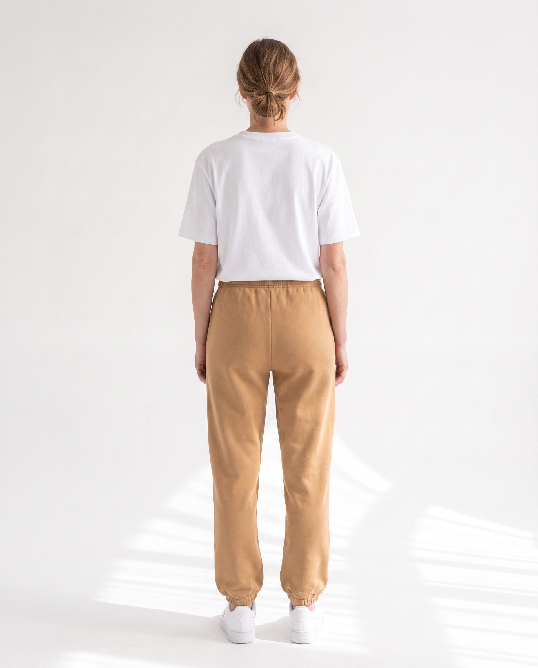 The Heavy Sweatpant in camel, back view