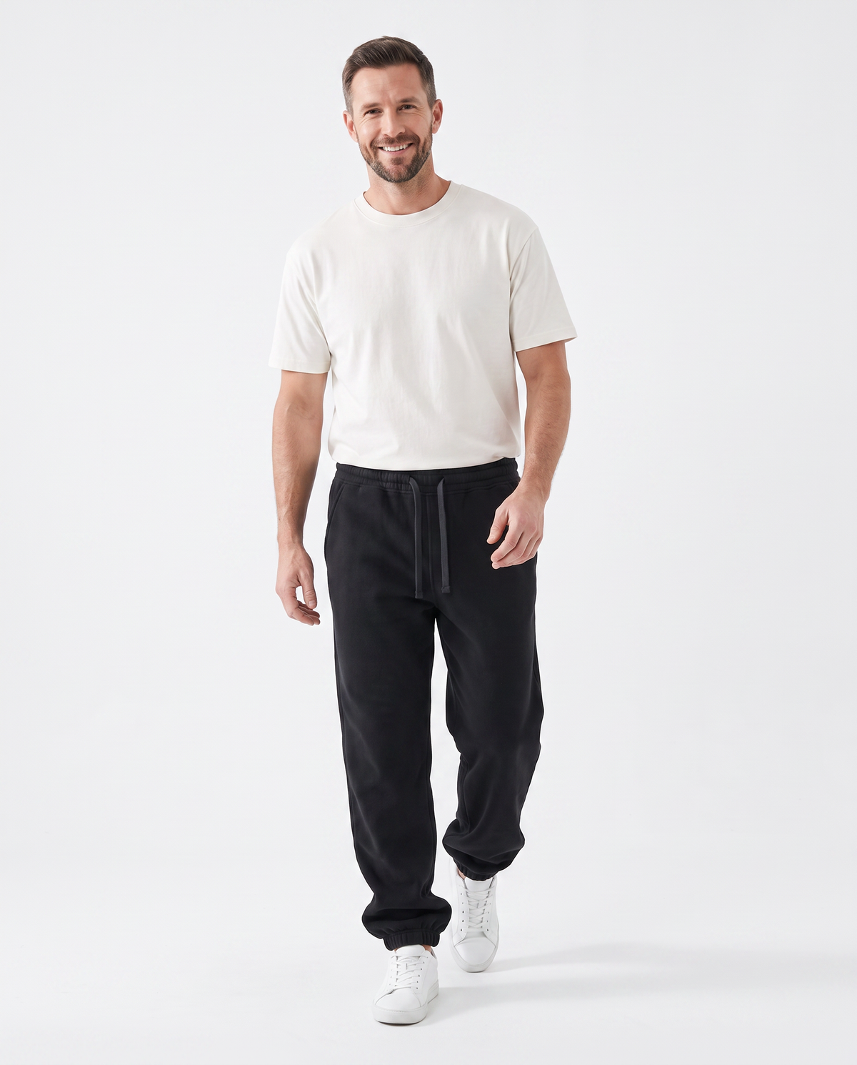 color::Black|The Heavy Sweatpant in black, on model