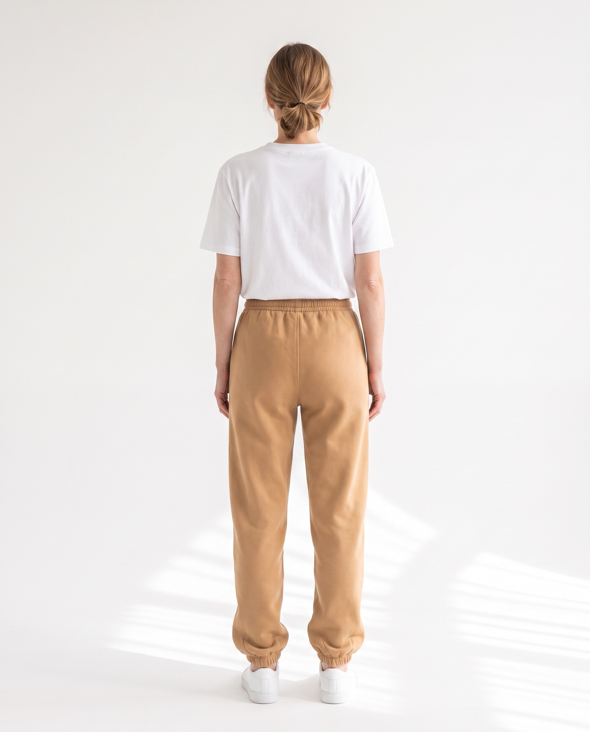 The Heavy Sweatpant in camel, back view