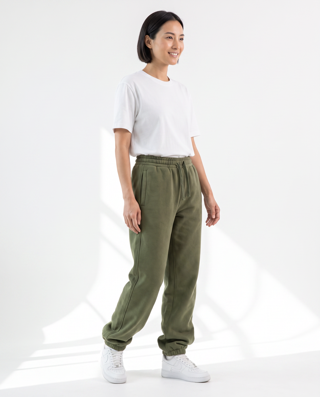 The Heavy Sweatpant in olive, side view