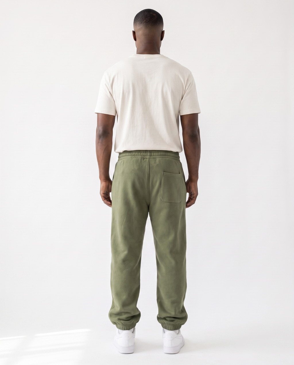 The Heavy Sweatpant in olive, back view