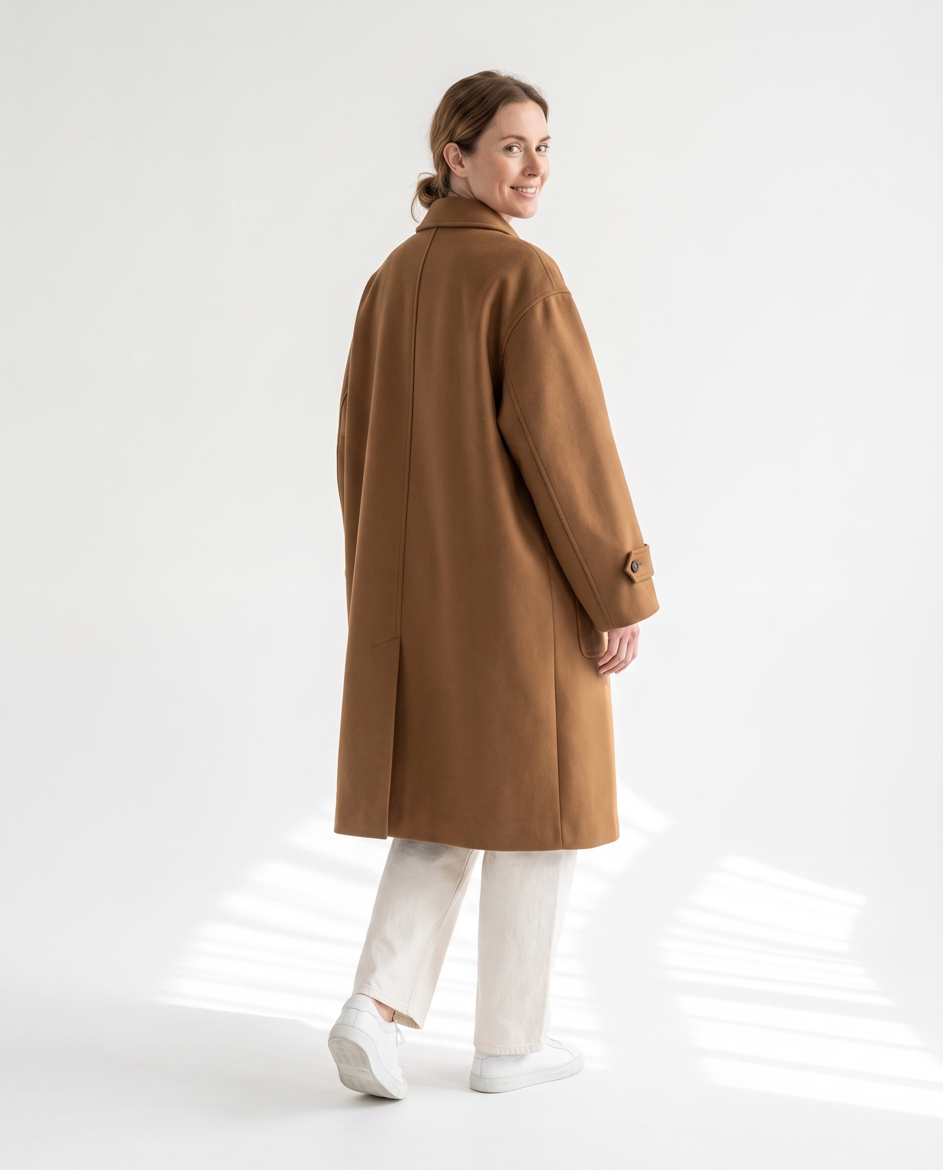 The Coat in camel, back view